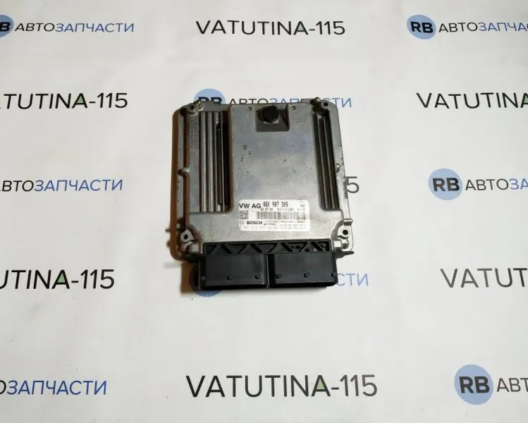 06K907309 Блок управления двигателем
