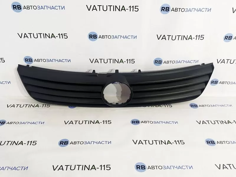 KH9539990 Решітка радіатора -ембл.