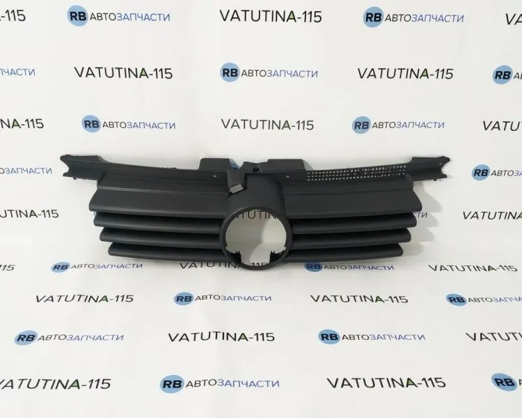 KH9543990 Решітка радіатора -ембл.