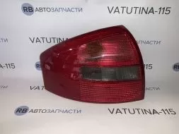 Ліхтар задній L червоно-димч.